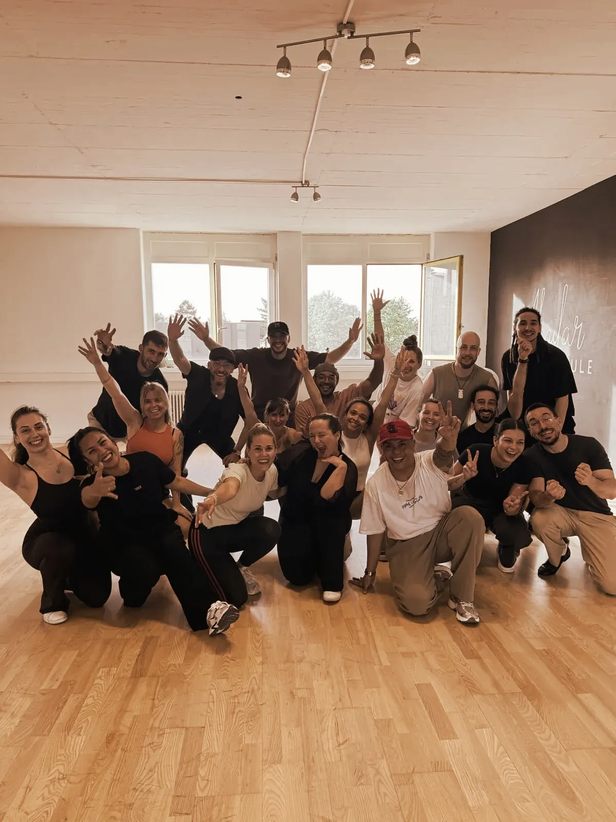 The whole group cheering at the end of the workshops